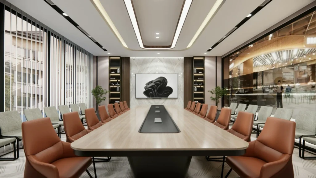 Salle de réunion design avec grande table et fauteuils en cuir cognac