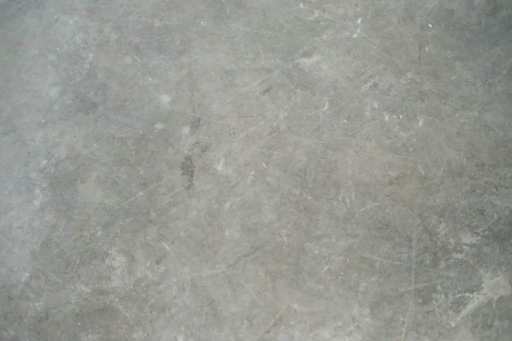 Texture d'enduit minéral et de béton ciré gris